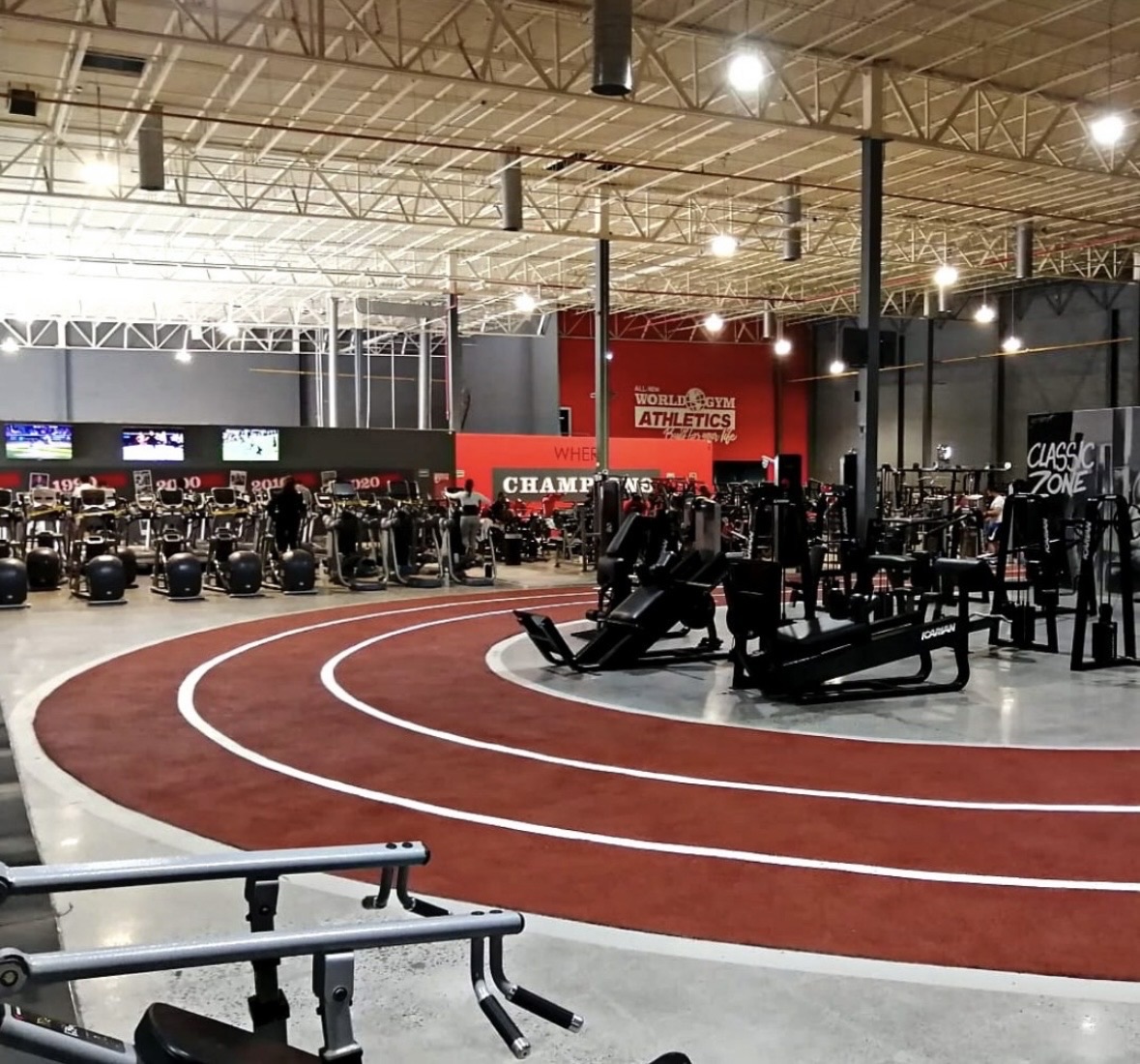 Indoor running track with a rubber training surface.
